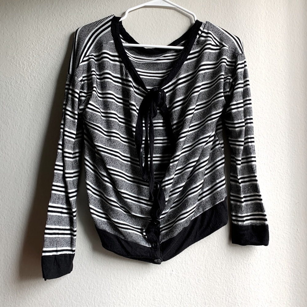Really cute long sleeve, button & bow open back!
